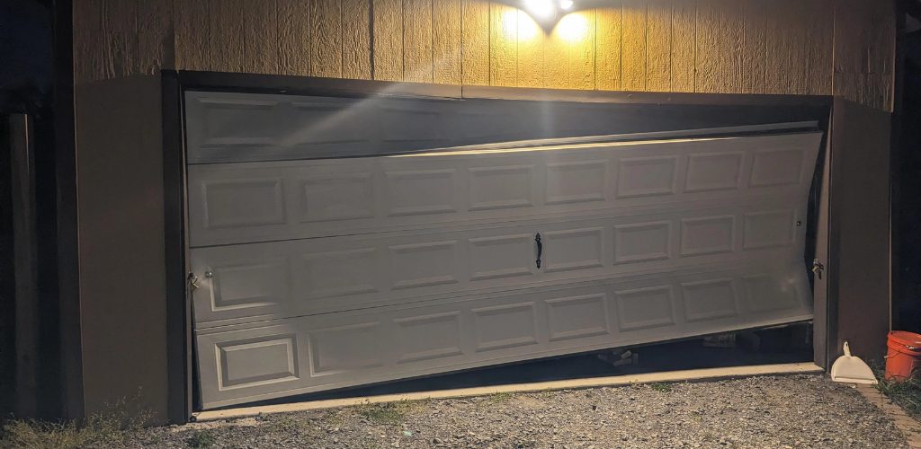 Lubricating garage door springs to prevent rust and noise.