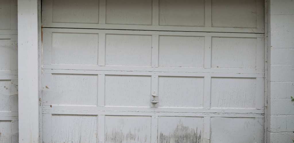 Realignment of damaged or weather worn door panels Realignment of damaged or weather worn door panels