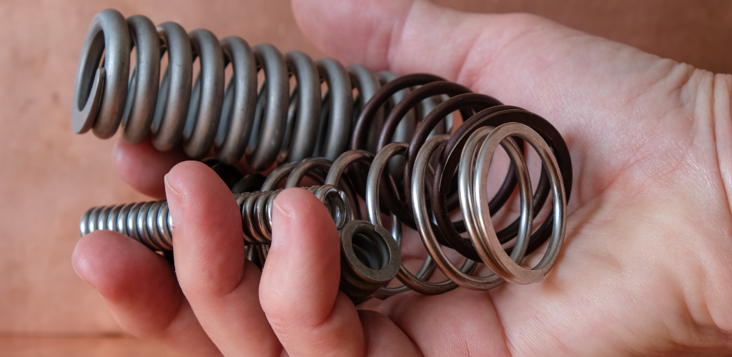 Replacement of torsion & tension springs Replacement of torsion & tension springs