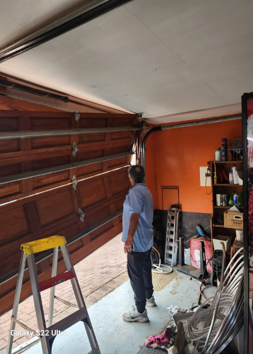 12 Professional garage door motor repair for a smooth opening.