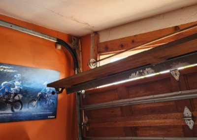 Vertical slat garage door design for contemporary home curb appeal. - Bedfordview Garage Door Repairs | Your Garage Door Guy Vertical slat garage door design for contemporary home curb appeal.