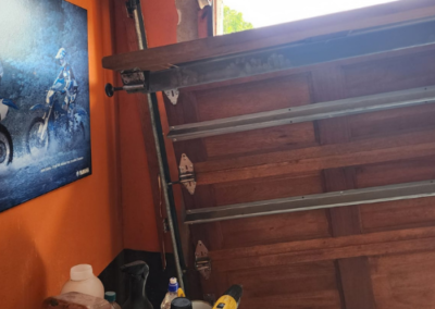 Upgrading an old garage door motor to a high-speed system. - Bedfordview Garage Door Repairs | Your Garage Door Guy Upgrading an old garage door motor to a high-speed system.