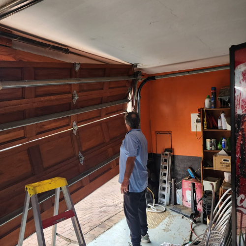 Untitled design (55) Stylish wood-look garage door installation in Greenstone.